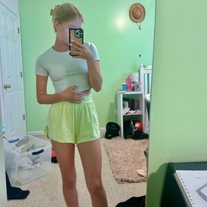 green shorts